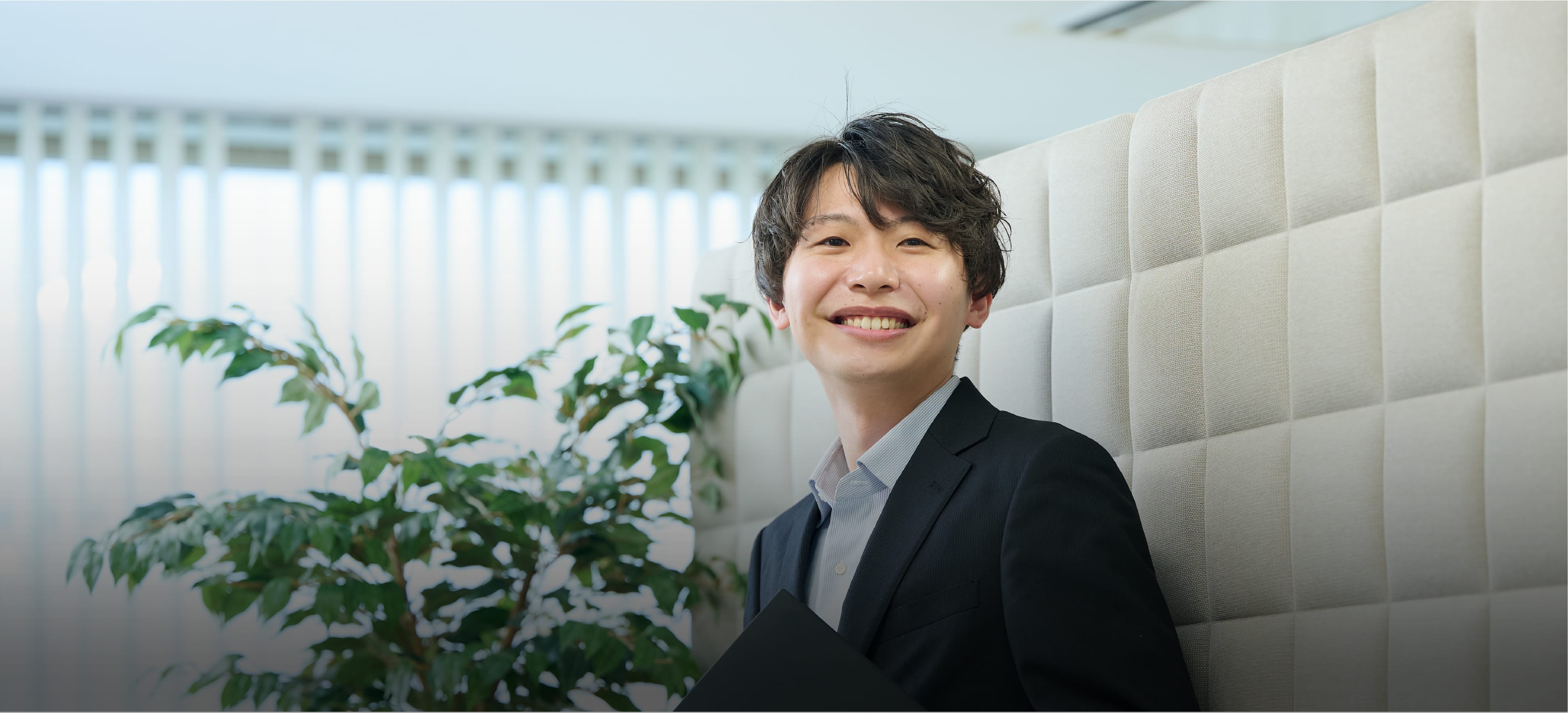 システム開発の最前線に立つ若手エンジニア